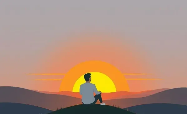 Person enjoying solitude on a hilltop at sunset